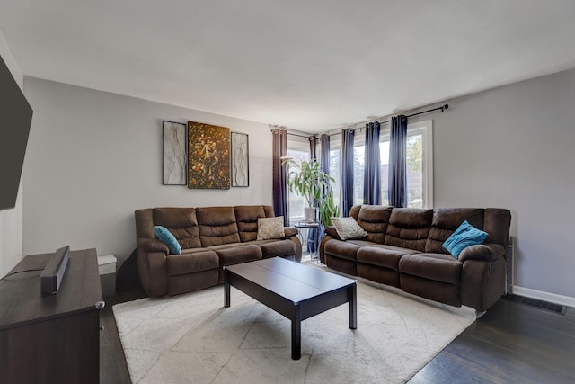 479 Oak St, Des Plaines, IL 60016 - living room with light wood finished floors, visible vents, and baseboards
