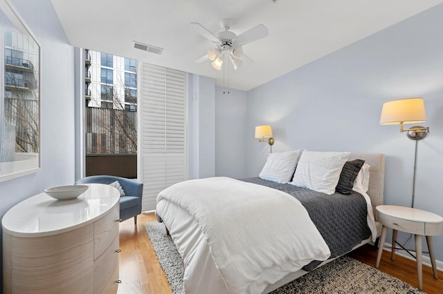 1720 Oak Ave Unit 202, Evanston, IL 60201 - bedroom with wood finished floors and a ceiling fan