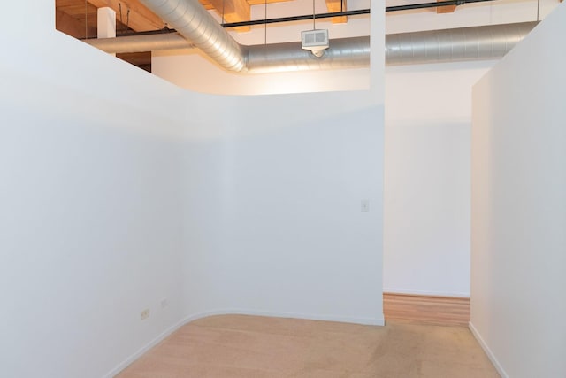 1250 W Van Buren St Unit 203, Chicago, IL 60607 - basement featuring carpet floors and baseboards