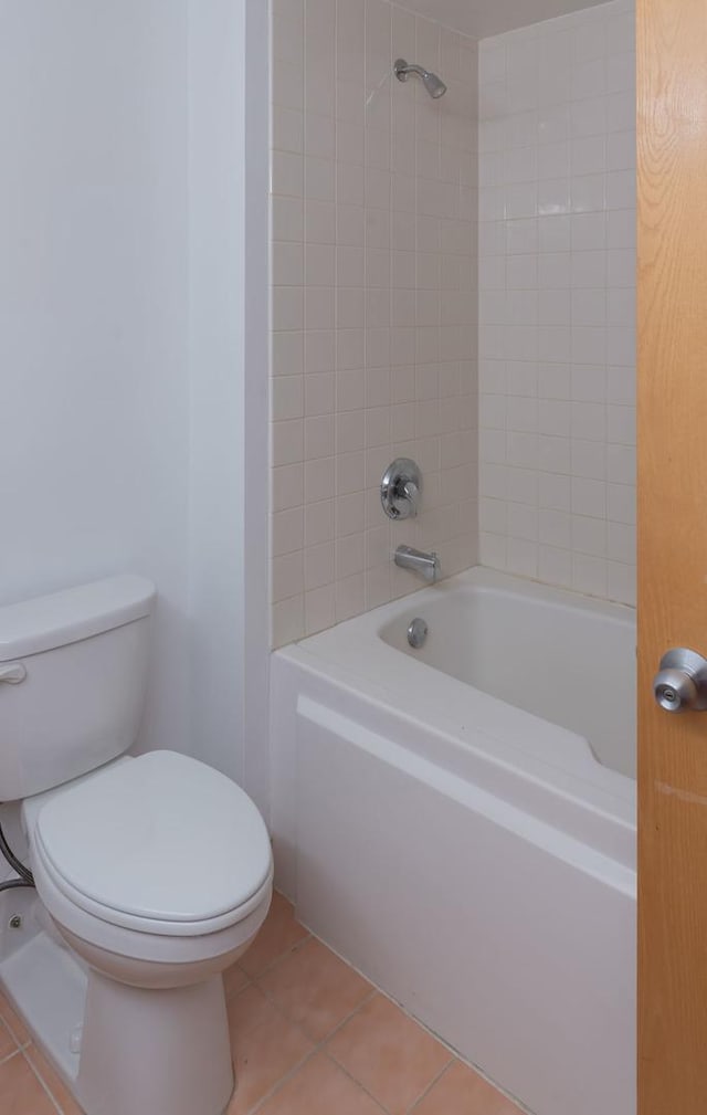 1250 W Van Buren St Unit 203, Chicago, IL 60607 - bathroom featuring tile patterned floors, toilet, and tub / shower combination