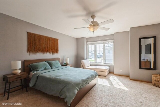 bedroom with carpet floors, a ceiling fan, and baseboards