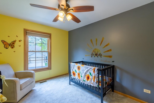 534 Philip Dr, Bartlett, IL 60103 - carpeted bedroom featuring baseboards, a nursery area, and ceiling fan