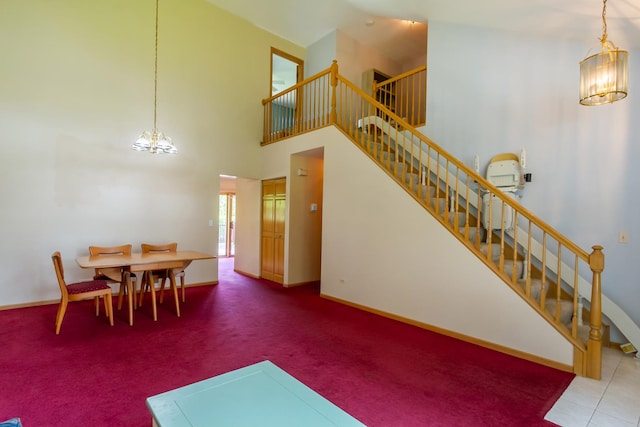 534 Philip Dr, Bartlett, IL 60103 - dining area with a chandelier, stairs, baseboards, and carpet floors