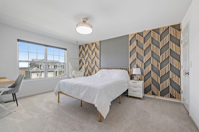 bedroom with carpet and baseboards