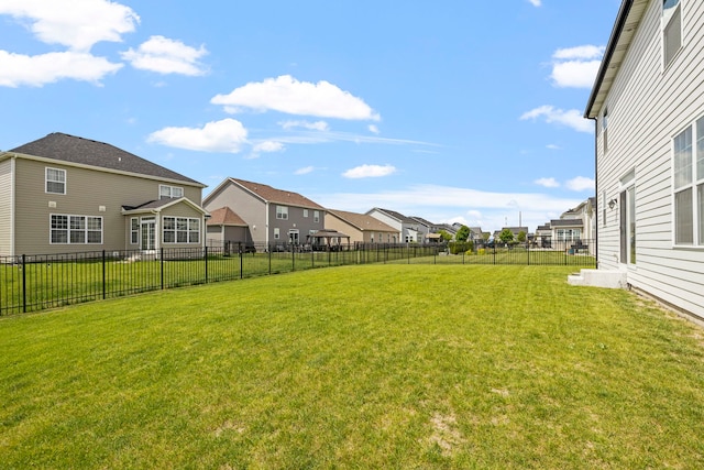 view of yard featuring a residential view