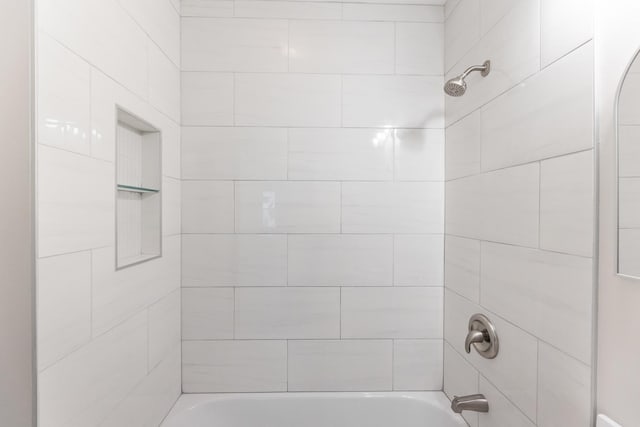 full bath featuring shower / washtub combination