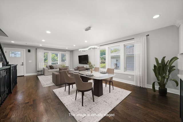 dining space featuring stairway, dark wood finished floors, and recessed lighting