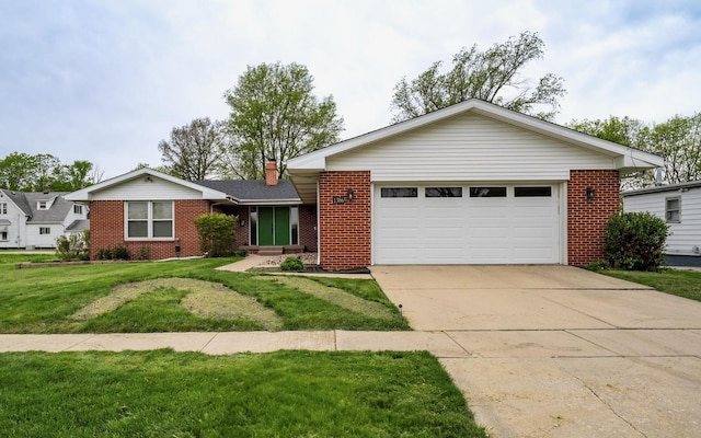 1306 Ewing St, Bloomington, IL 61701 - ranch-style home with driveway, a chimney, a garage, brick siding, and a front lawn