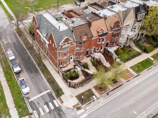 birds eye view of property with a residential view