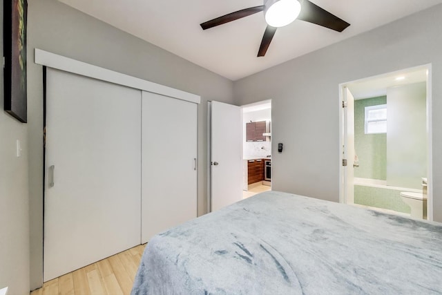 1811 W 17th St Unit 201, Chicago, IL 60608 - bedroom featuring light wood-type flooring, a ceiling fan, ensuite bath, and a closet