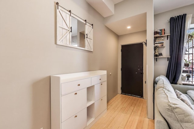 1811 W 17th St Unit 201, Chicago, IL 60608 - interior space with a barn door and light wood finished floors