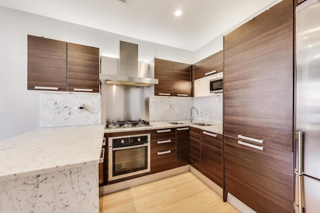 1811 W 17th St Unit 201, Chicago, IL 60608 - kitchen featuring backsplash, appliances with stainless steel finishes, modern cabinets, and wall chimney exhaust hood