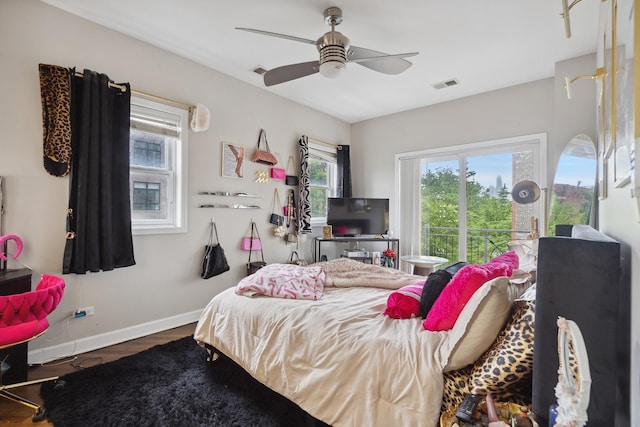 531 N Racine Ave Unit 3, Chicago, IL 60622 - bedroom with baseboards, wood finished floors, and a ceiling fan