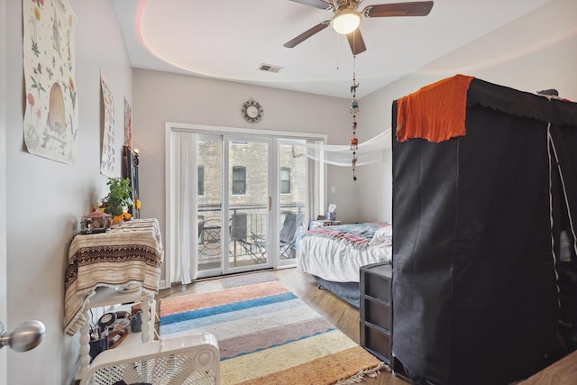 531 N Racine Ave Unit 3, Chicago, IL 60622 - bedroom featuring access to outside, wood finished floors, and a ceiling fan