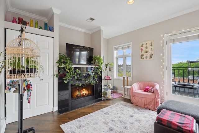 531 N Racine Ave Unit 3, Chicago, IL 60622 - living area with wood finished floors, crown molding, a warm lit fireplace, baseboards, and recessed lighting
