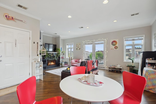 531 N Racine Ave Unit 3, Chicago, IL 60622 - dining space with crown molding, wood finished floors, recessed lighting, a fireplace with flush hearth, and french doors