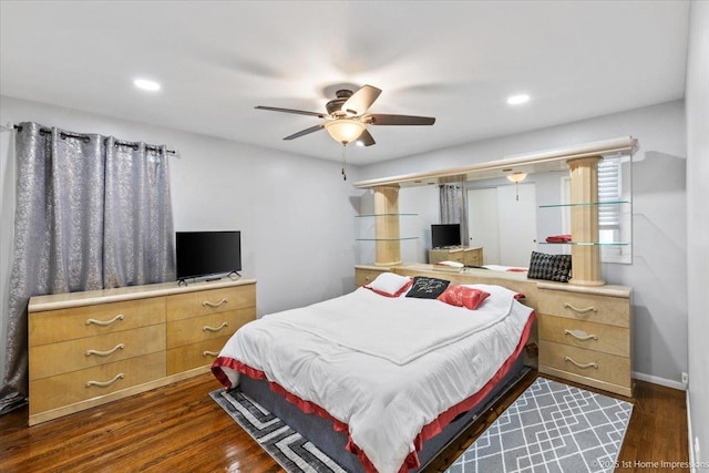bedroom featuring recessed lighting, ceiling fan, and dark wood finished floors
