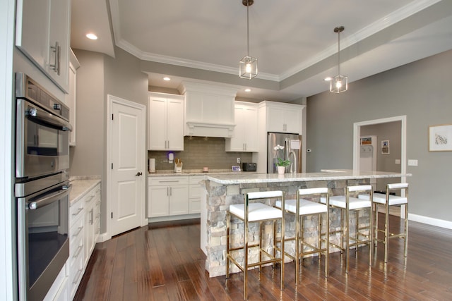 4432 Bryant Dr, Quincy, IL 62305 - kitchen with crown molding, dark wood-style floors, backsplash, and stainless steel appliances