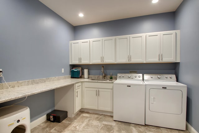 4432 Bryant Dr, Quincy, IL 62305 - laundry area with baseboards, washer and dryer, cabinet space, and a sink