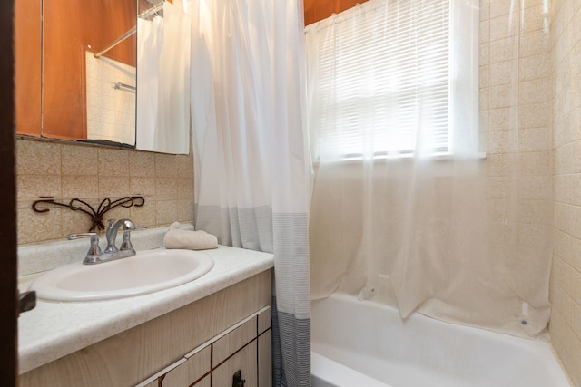 420 N Hebbard St, Joliet, IL 60432 - full bath featuring decorative backsplash, shower / bath combo, and vanity