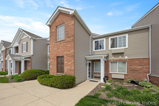 view of front of property with brick siding