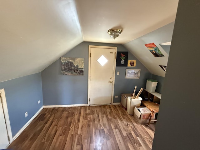 14500 Sawyer Ave, Midlothian, IL 60445 - bonus room featuring baseboards, wood finished floors, and vaulted ceiling