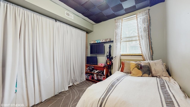 bedroom with visible vents