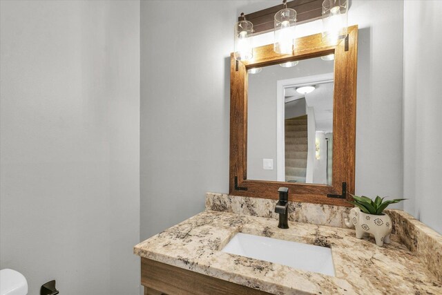 half bathroom with vanity