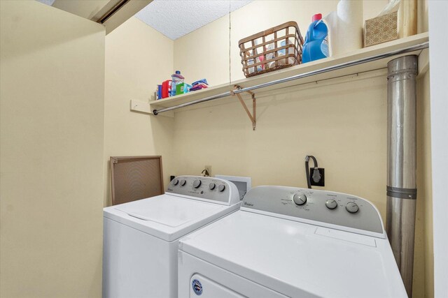laundry area featuring laundry area and washing machine and clothes dryer