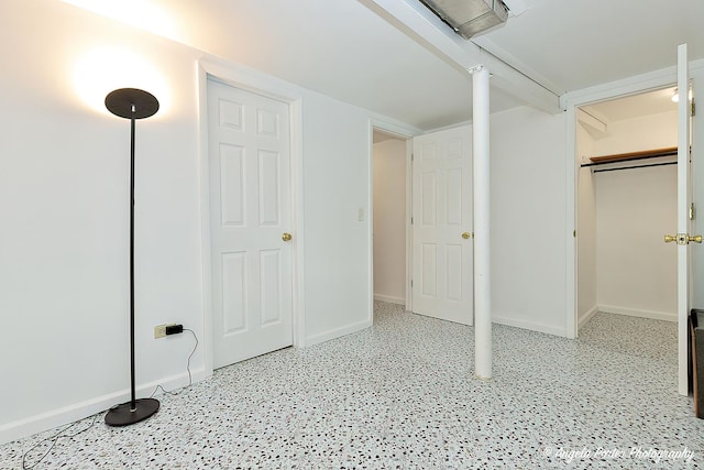 basement featuring baseboards