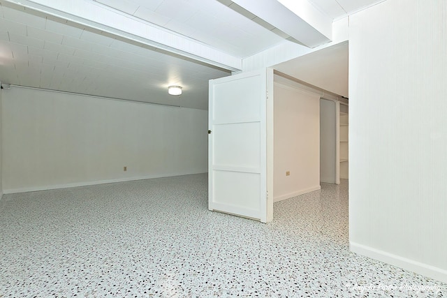 basement featuring baseboards