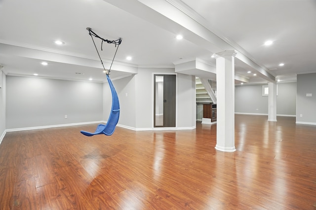 122 Periwinkle Ln, Bolingbrook, IL 60490 - basement featuring crown molding, baseboards, stairs, recessed lighting, and wood finished floors