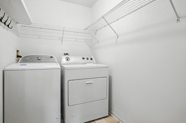 122 Periwinkle Ln, Bolingbrook, IL 60490 - clothes washing area featuring washer and dryer