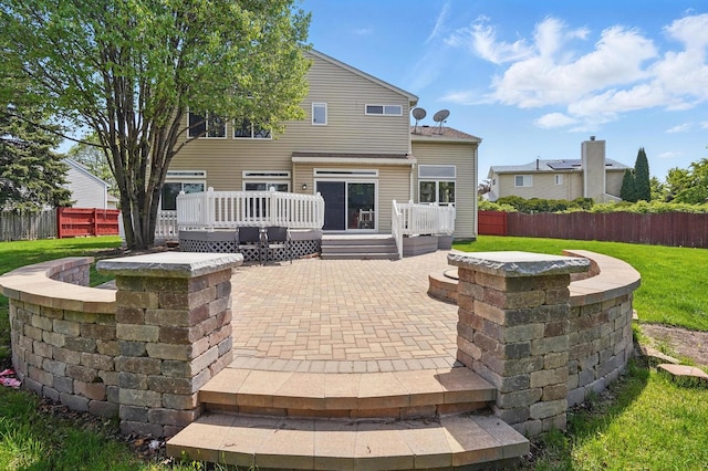122 Periwinkle Ln, Bolingbrook, IL 60490 - rear view of house featuring a patio area and a deck