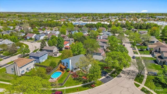 aerial perspective of suburban area with a pool