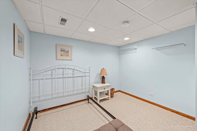 bedroom featuring carpet floors, a paneled ceiling, baseboards, and recessed lighting