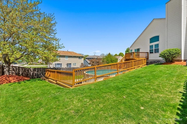 view of yard with a wooden deck