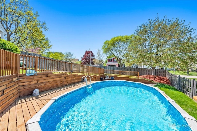 view of pool featuring a fenced backyard