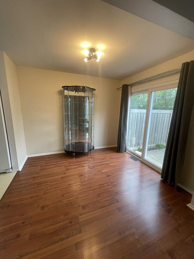 2008 Jamestown Dr Unit 0, Palatine, IL 60074 - empty room with wood finished floors and baseboards