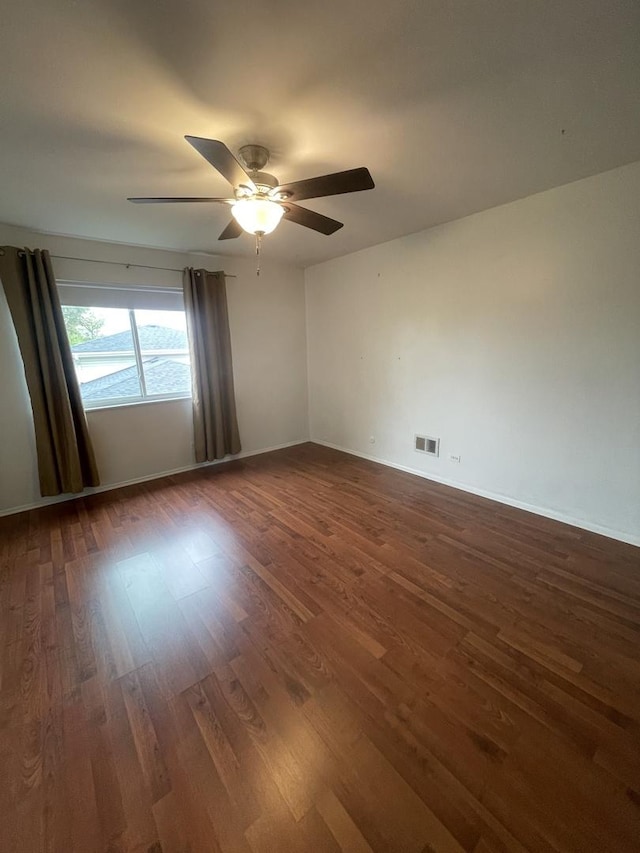 2008 Jamestown Dr Unit 0, Palatine, IL 60074 - empty room with ceiling fan, dark wood-style flooring, and baseboards