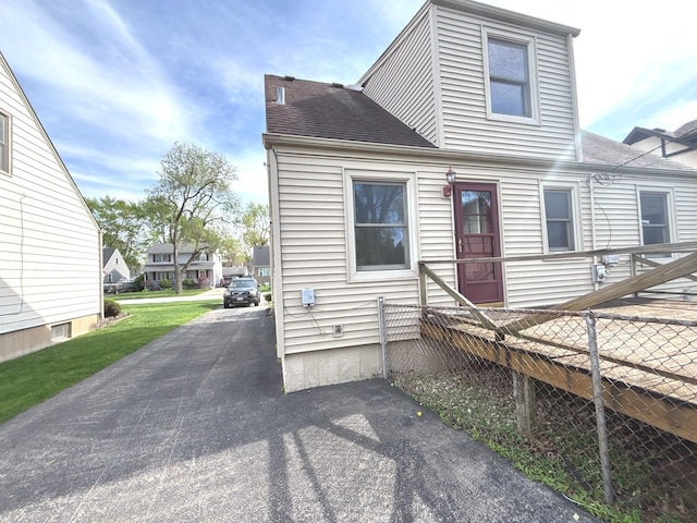 5404 Kimball Pl, Oak Lawn, IL 60453 - view of front of home with a shingled roof and fence
