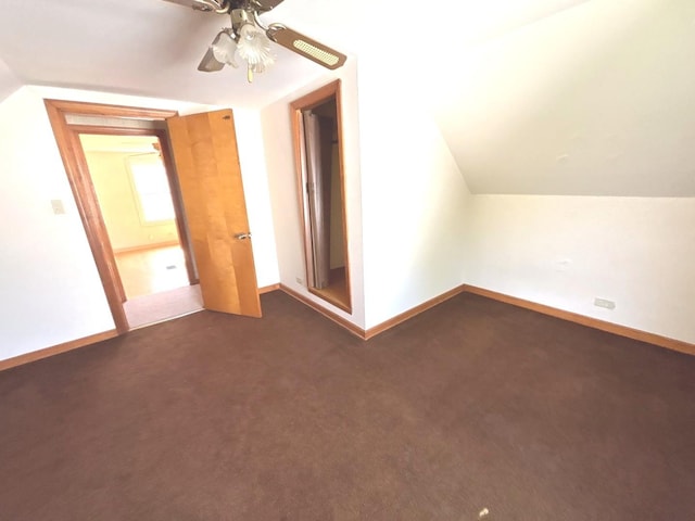 5404 Kimball Pl, Oak Lawn, IL 60453 - bonus room featuring ceiling fan, dark carpet, vaulted ceiling, and baseboards