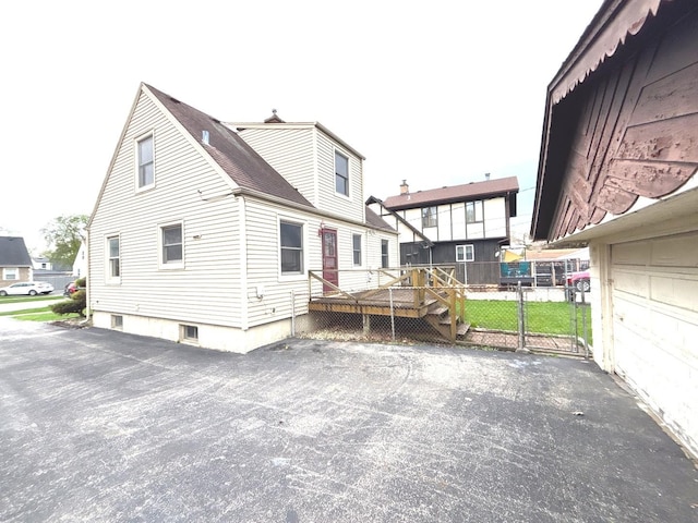5404 Kimball Pl, Oak Lawn, IL 60453 - rear view of property with a deck, roof with shingles, and fence