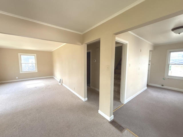 5404 Kimball Pl, Oak Lawn, IL 60453 - unfurnished room with carpet, ornamental molding, plenty of natural light, and stairs