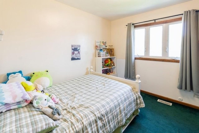 bedroom featuring carpet flooring, visible vents, and baseboards