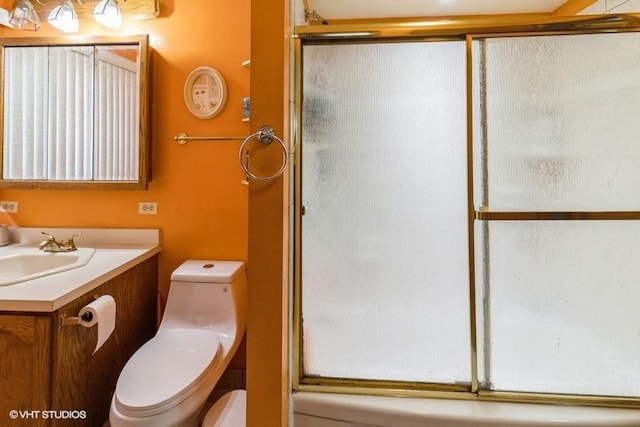 full bath featuring an enclosed shower, toilet, and vanity