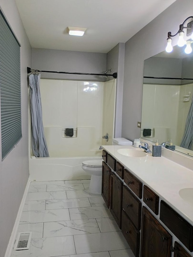 bathroom featuring marble finish floor, shower / bath combo with shower curtain, toilet, a sink, and visible vents