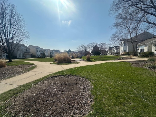 414 E Victoria Cir Unit 414, North Aurora, IL 60542 - surrounding community featuring a yard and a residential view