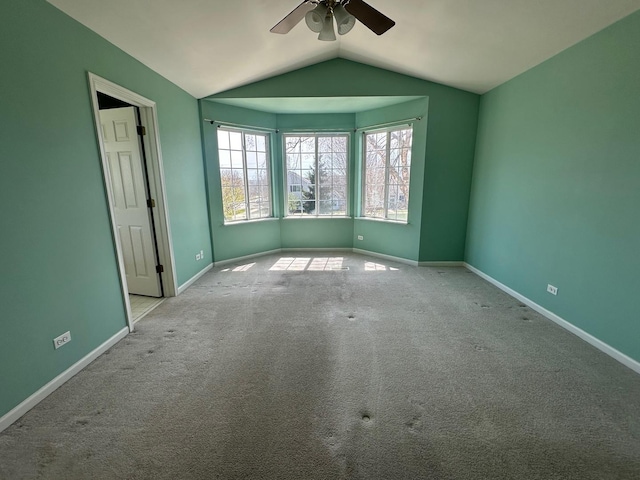 414 E Victoria Cir Unit 414, North Aurora, IL 60542 - carpeted empty room featuring baseboards, ceiling fan, and vaulted ceiling