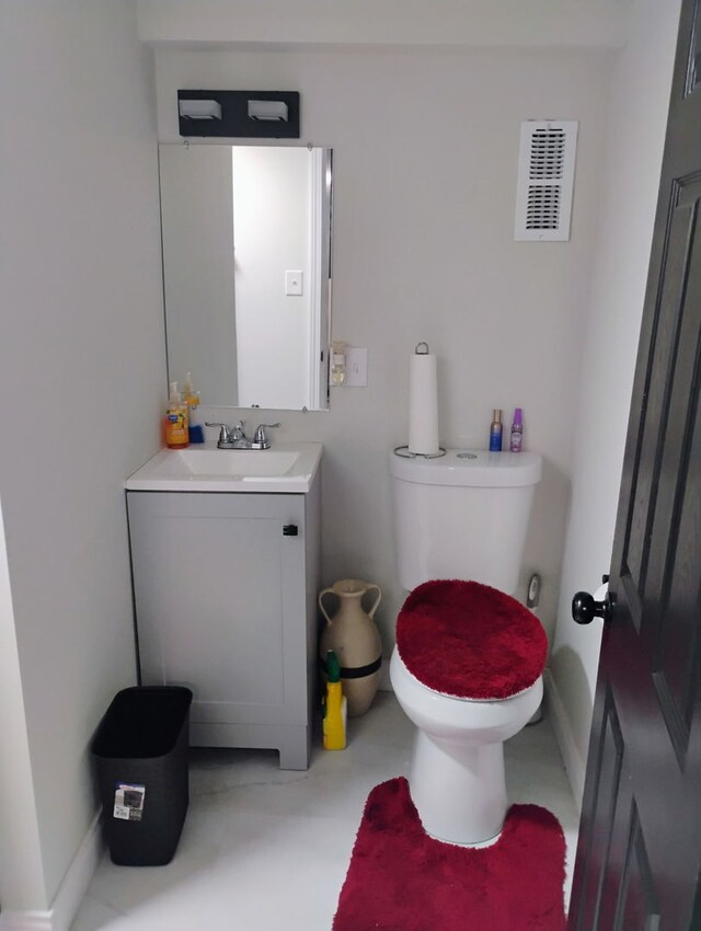 11414 S Wallace St, Chicago, IL 60628 - bathroom with vanity and toilet